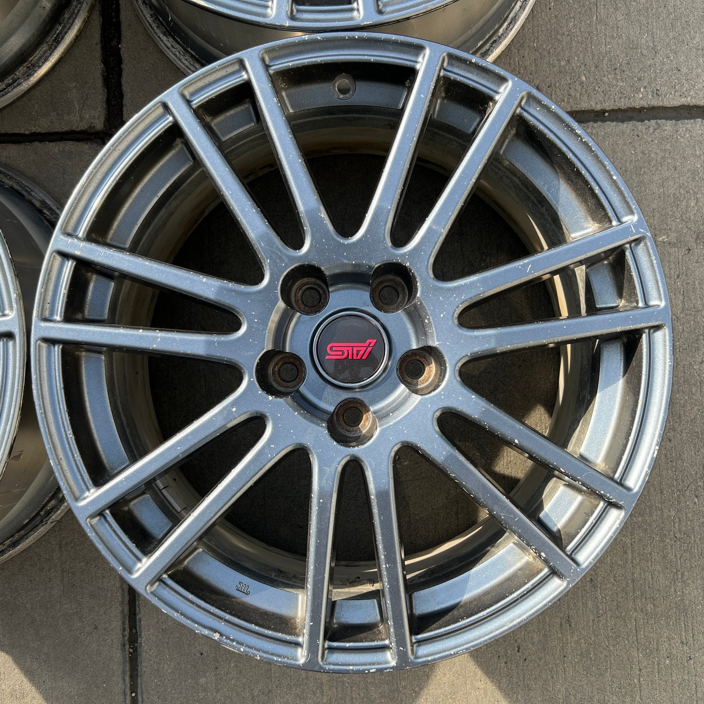 18” OEM Subaru STI Enkei flow-formed wheels