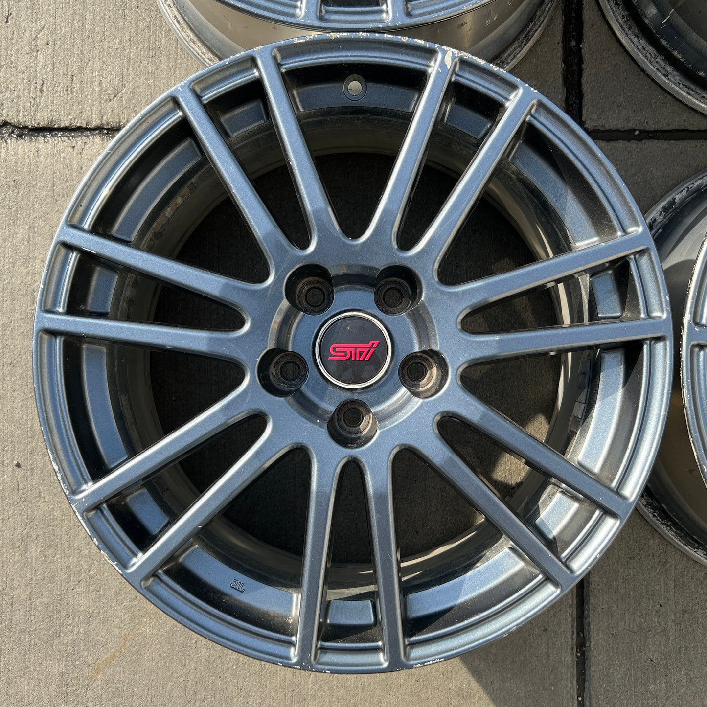 18” OEM Subaru STI Enkei flow-formed wheels