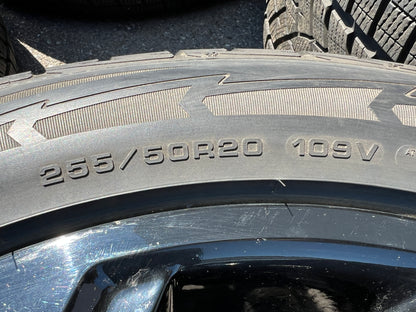 20” black Volkswagen Atlas wheels and 255/50R20 Goodyear winter tires